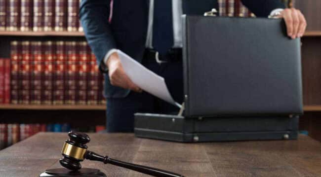 gavel and man with briefcase