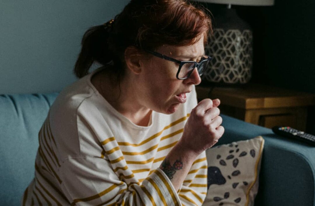 woman coughing