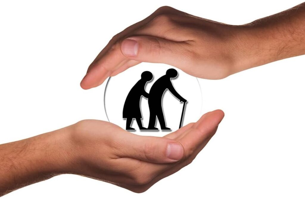 hands holding elderly icon